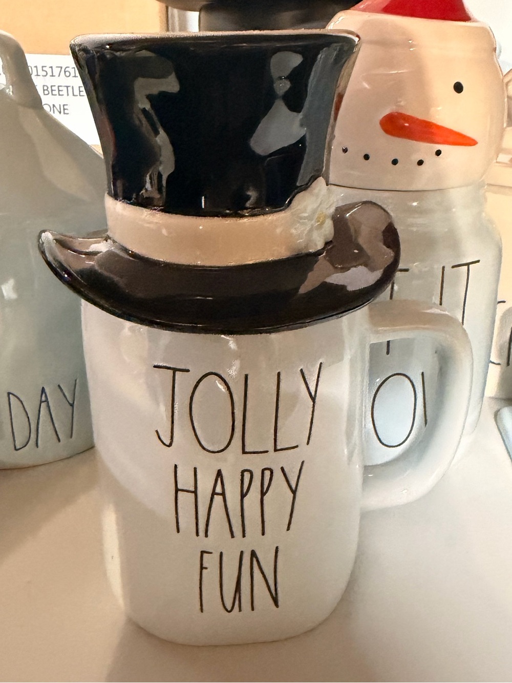 Rae Dunn White Ceramic 'Jolly Happy Fun' Snowman Mug with Black Hat